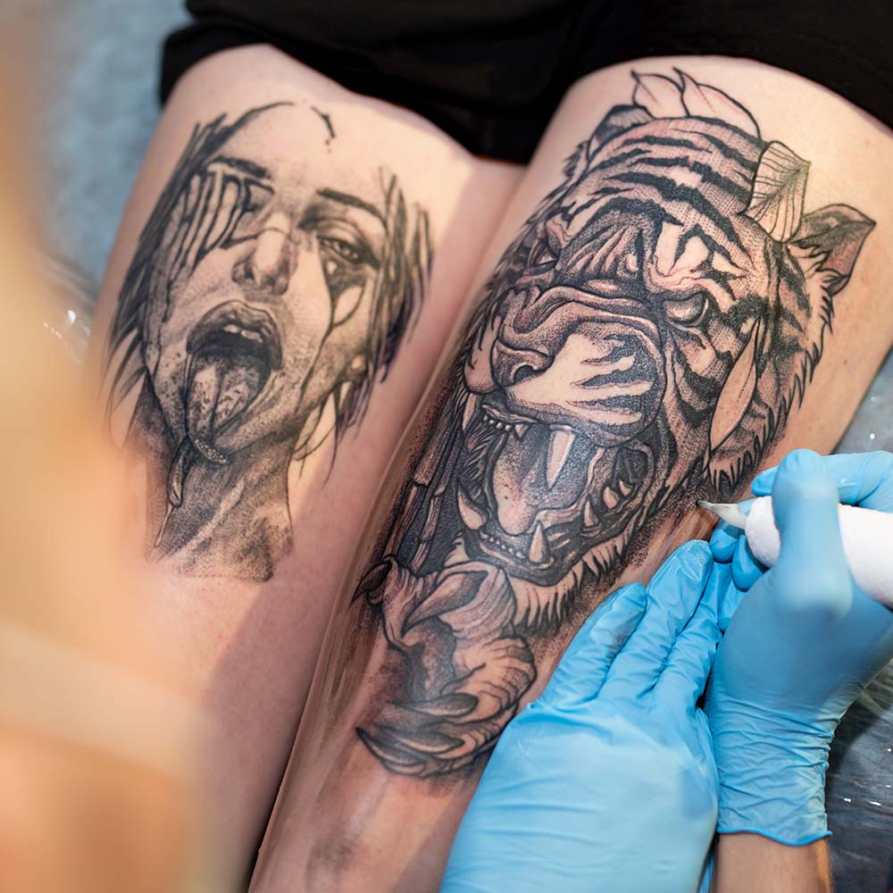 professional-tattoo-artist-makes-a-tattoo-on-a-wom-CDTRCBP.jpg professional-tattoo-artist-makes-a-tattoo-on-a-wom-CDTRCBP.jpg